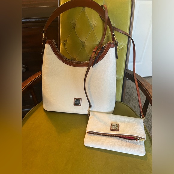 Dooney & Bourke Handbags - White Dooney & Bourke leather handbag/ shoulder bag and crossbody set.